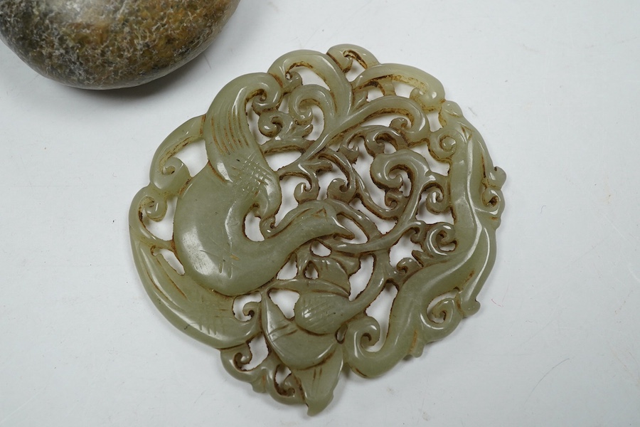 A 19th century Chinese reticulated celadon jade disc, 6.5cm diameter, a Ming style peach shaped brushwasher and a neolithic style carving. Condition - good